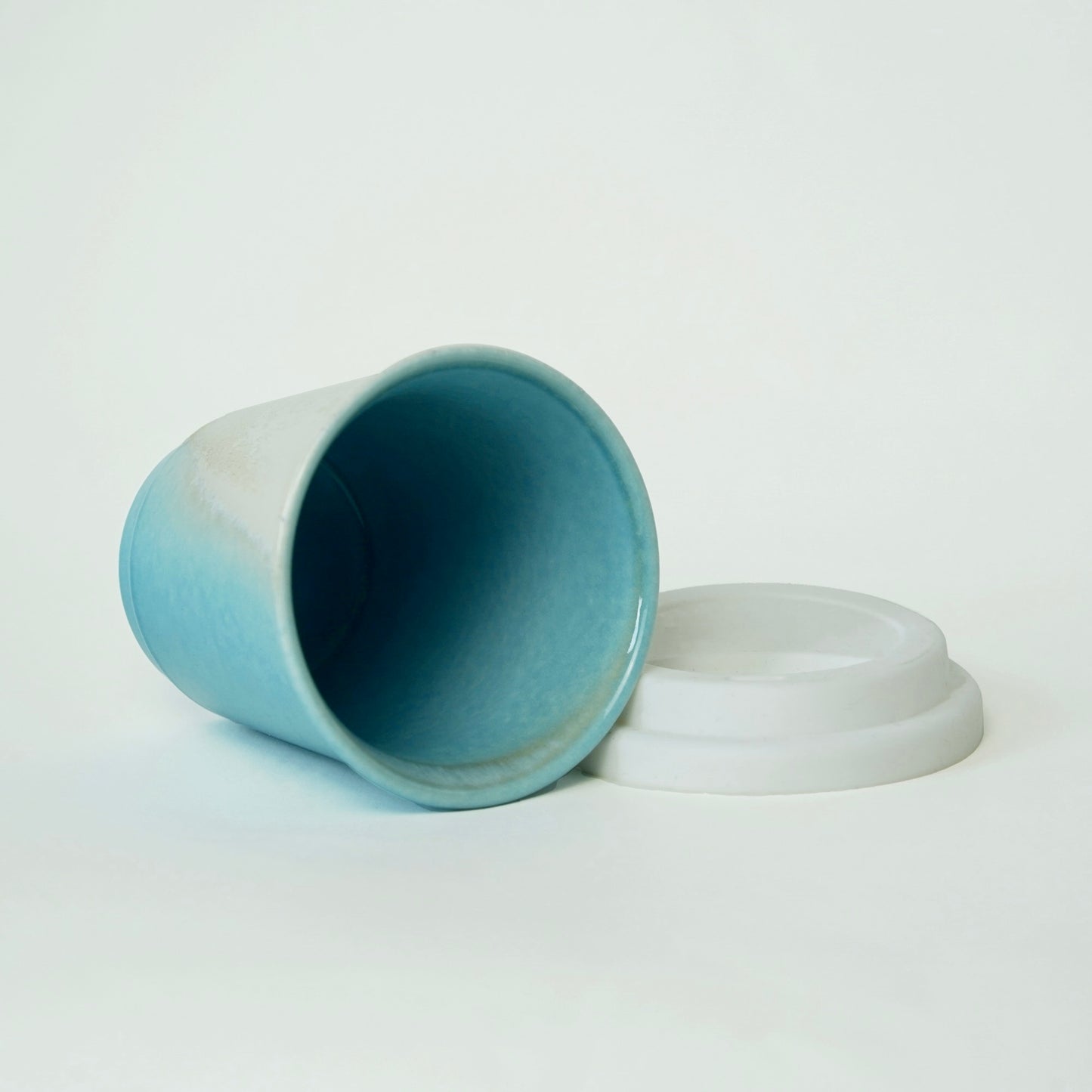 The inside of Sky Blue ceramic travel mug